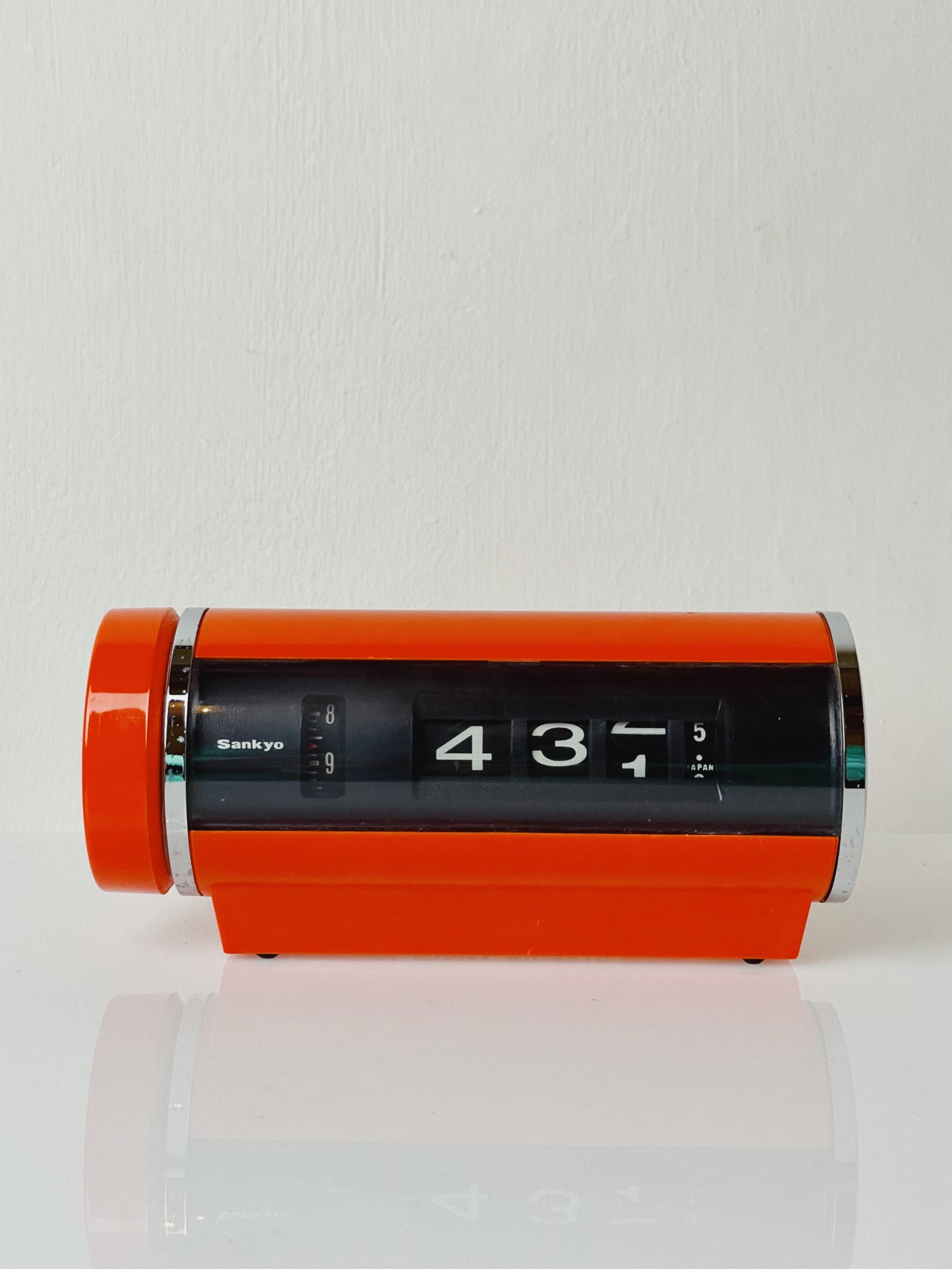 Sankyo orange space age roll clock