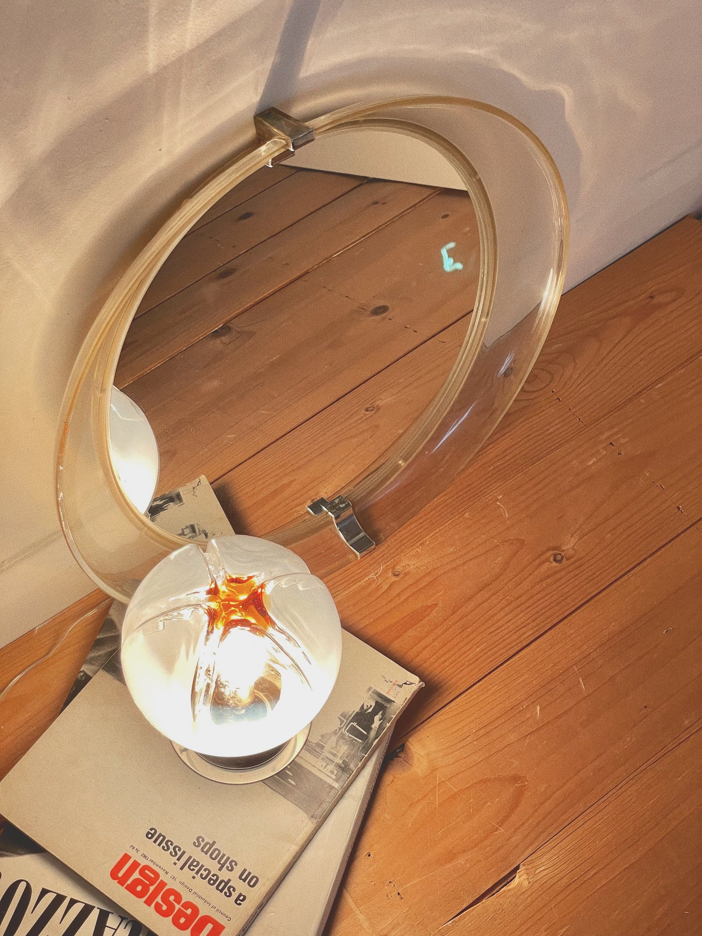 Deep framed space age mirror