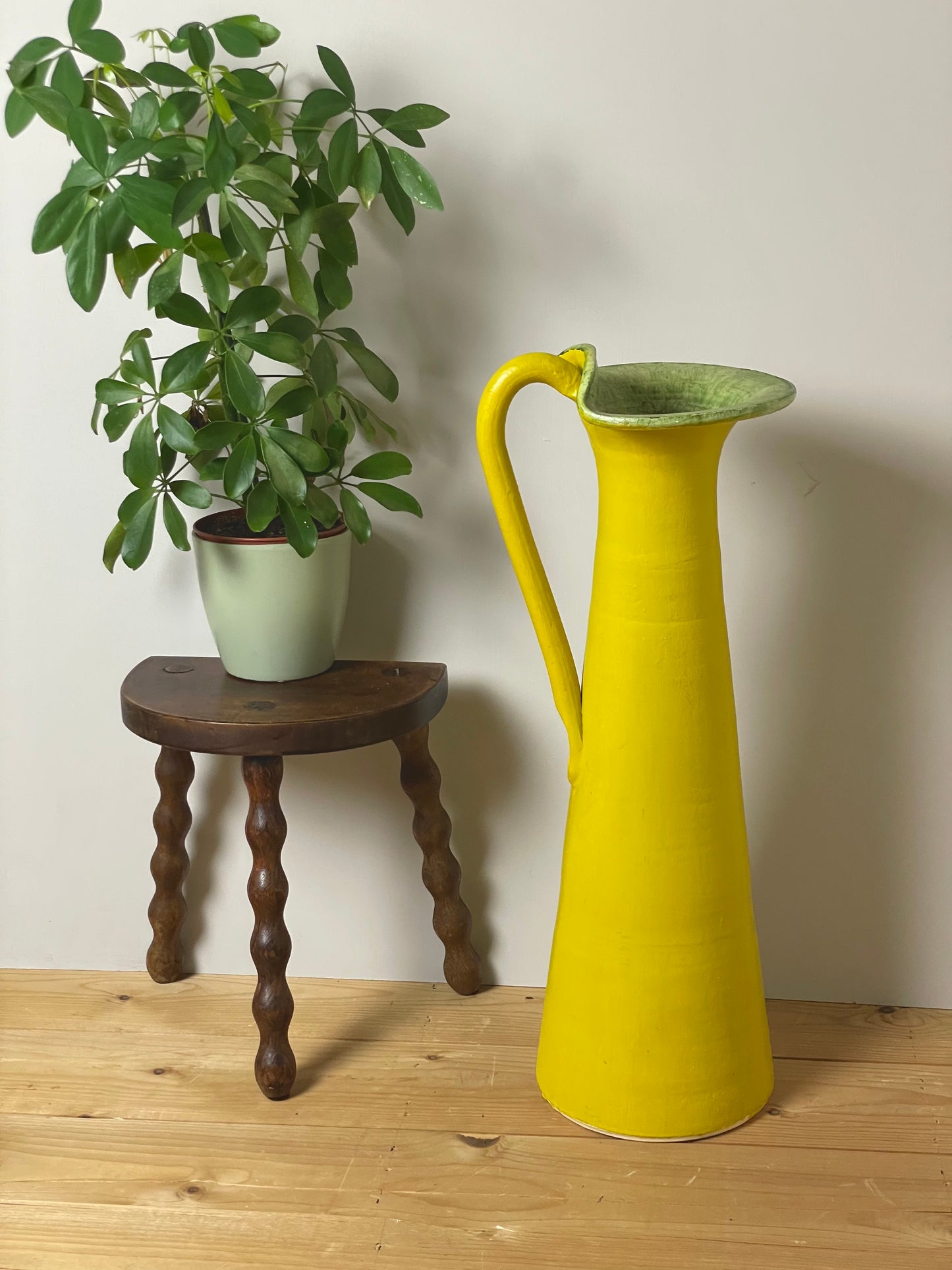 Large handmade yellow conical jug