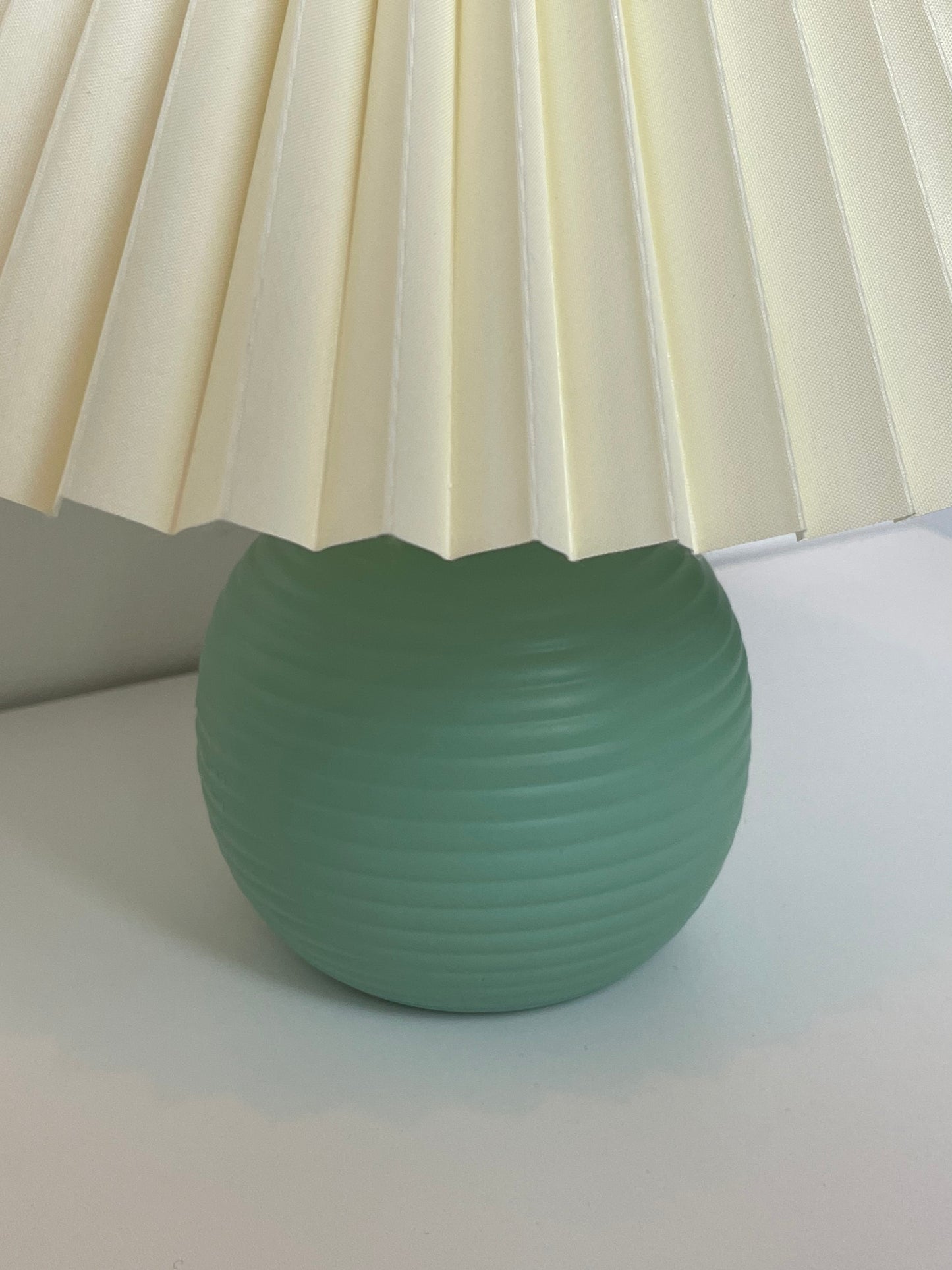 Ribbed ball lamps with pleated shade
