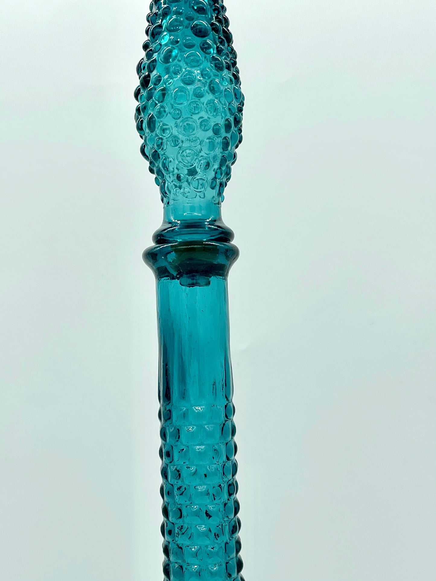 Teal coloured diamond hobnail genie bottle