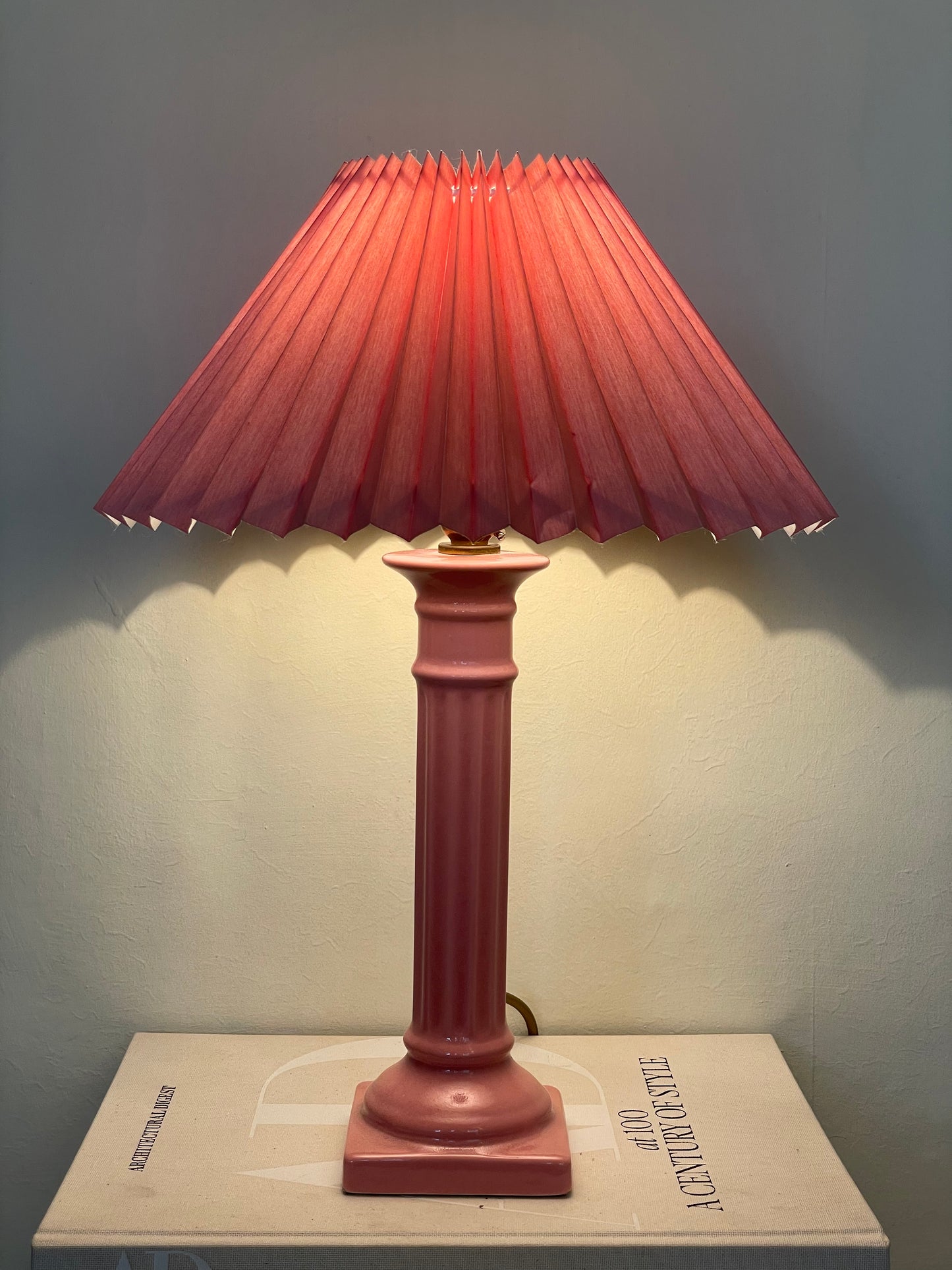 Pink corinthian column lamp with pleated shade