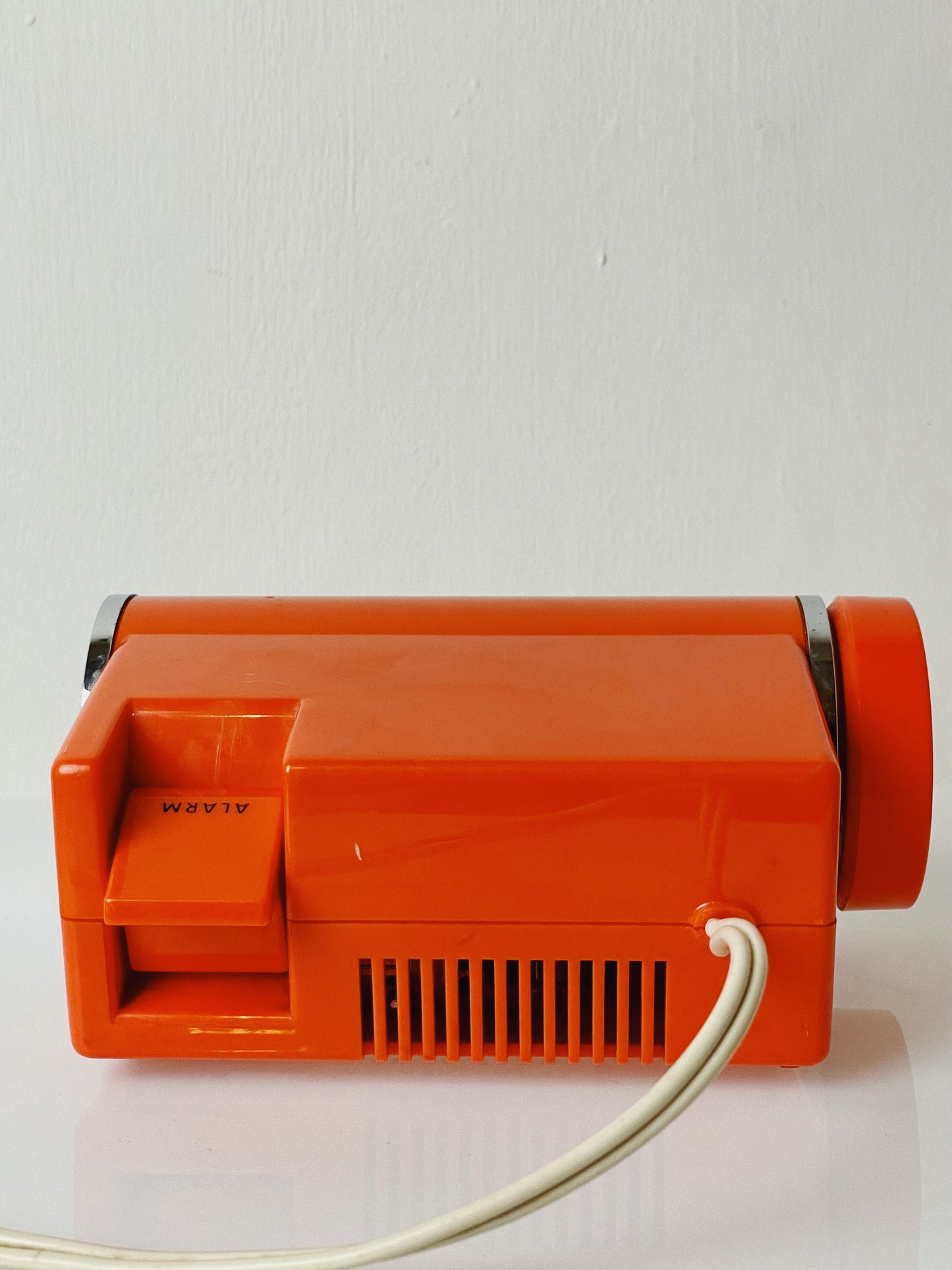 Sankyo orange space age roll clock