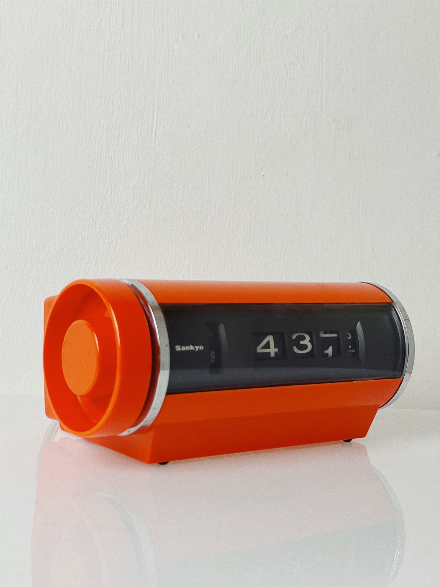 Sankyo orange space age roll clock