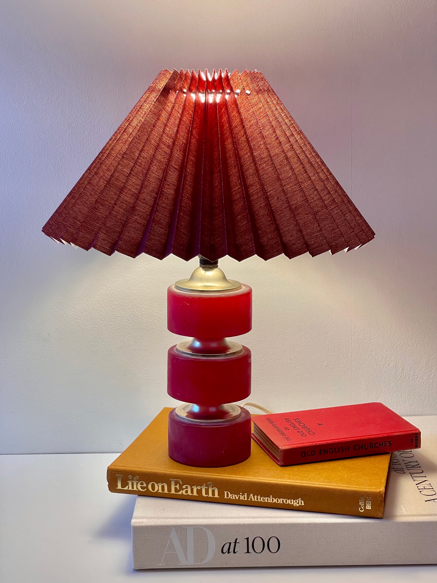 Pink stone hooped lamp with burgundy pleated shade