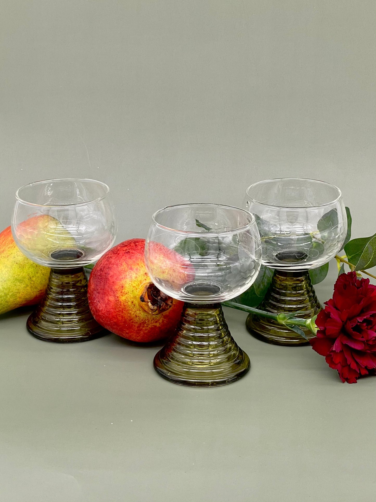 Set of three olive green ripple stemmed glasses
