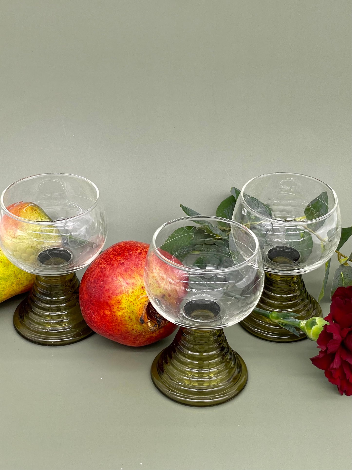 Set of three olive green ripple stemmed glasses