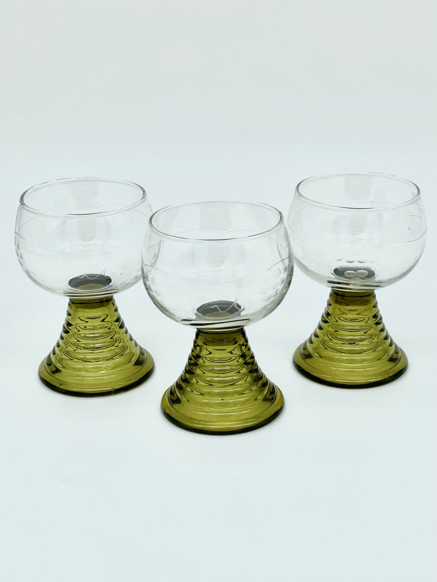Set of three olive green ripple stemmed glasses
