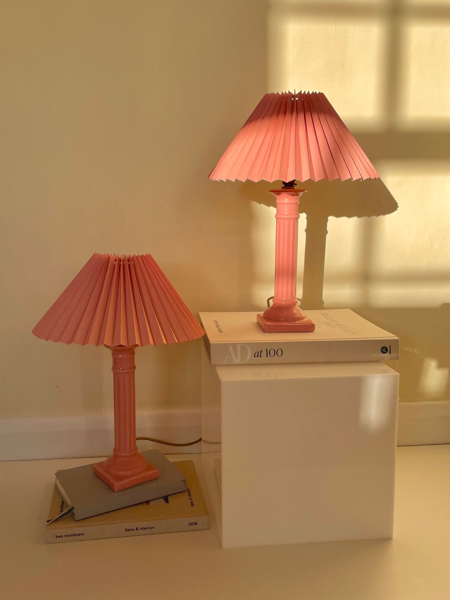 Pink corinthian column lamp with pleated shade