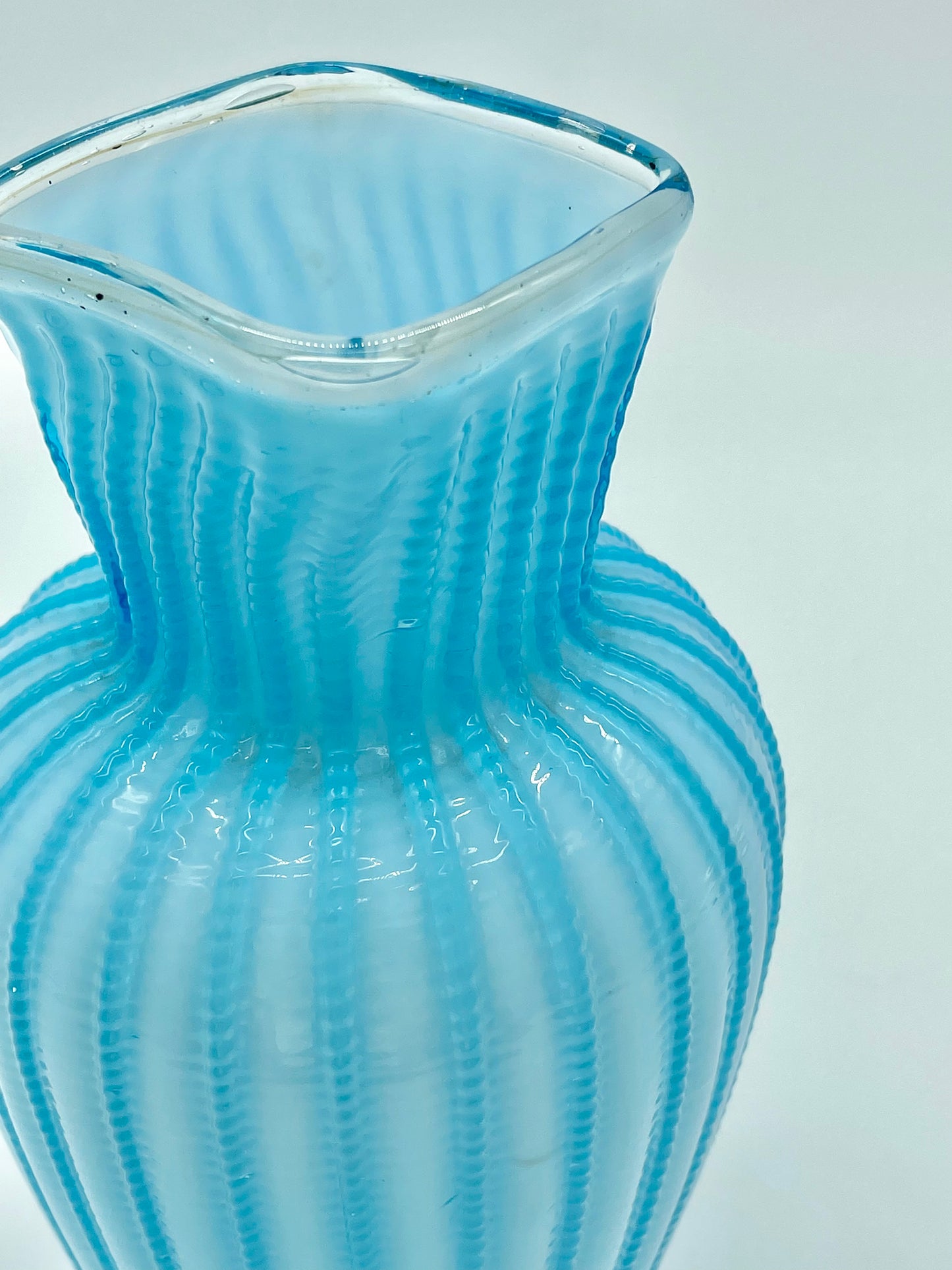 Antique blue glass ribbed cased vase