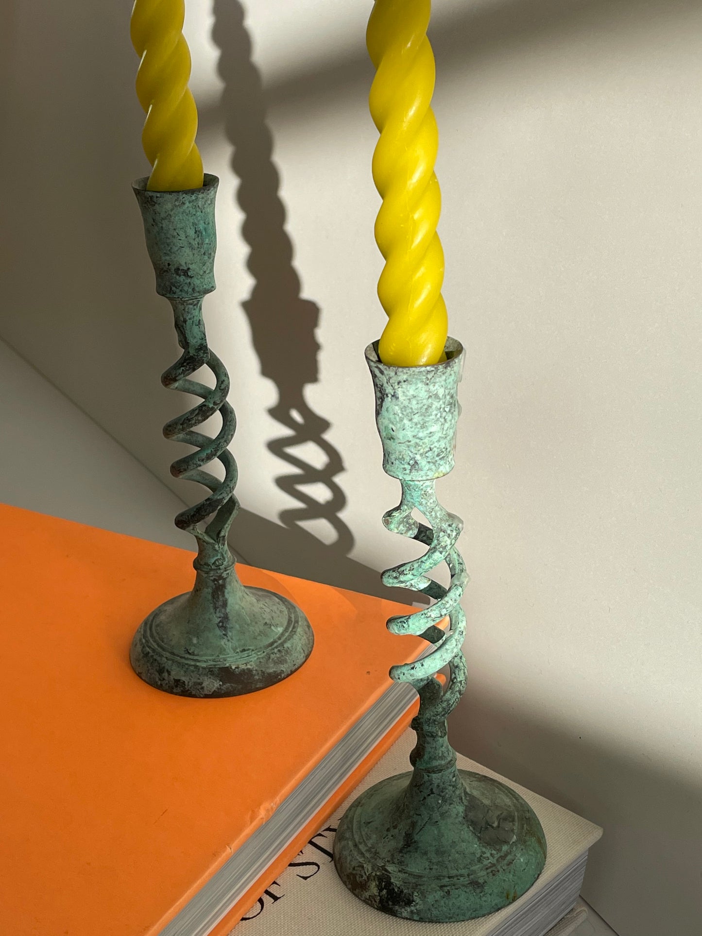 Twisted metal candlestick holders