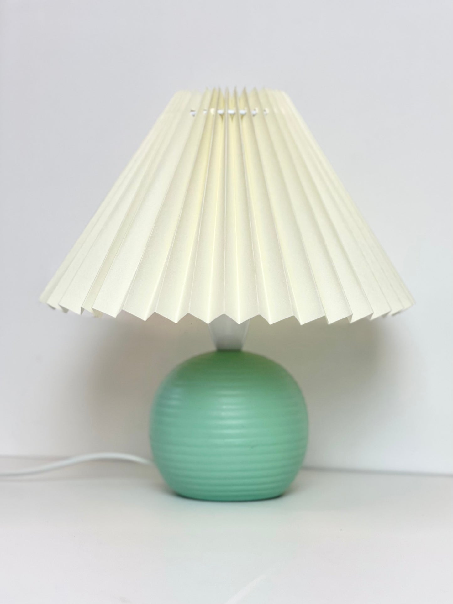 Ribbed ball lamps with pleated shade