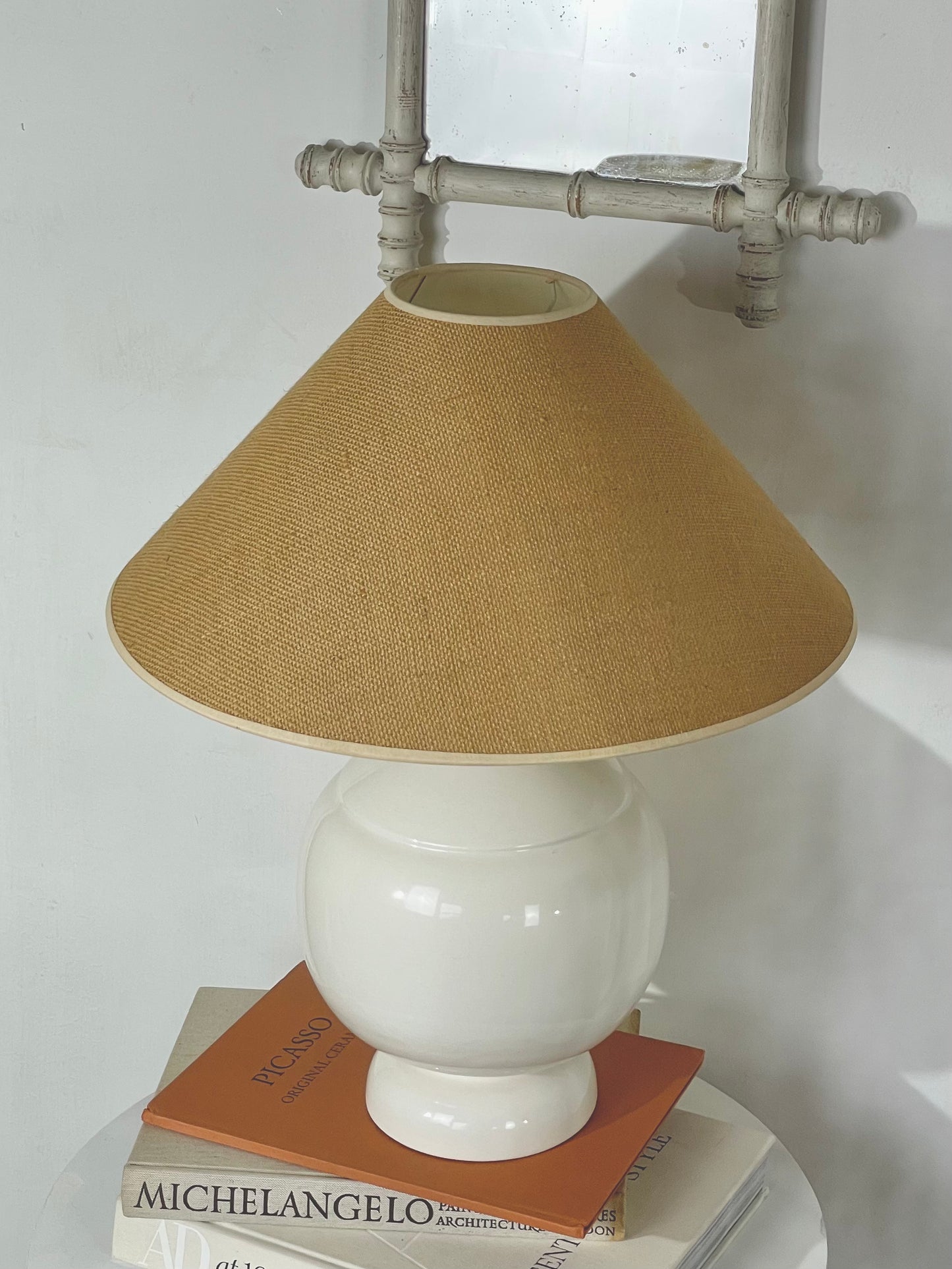 Heavy ceramic bulbous lamp base and hessian shade