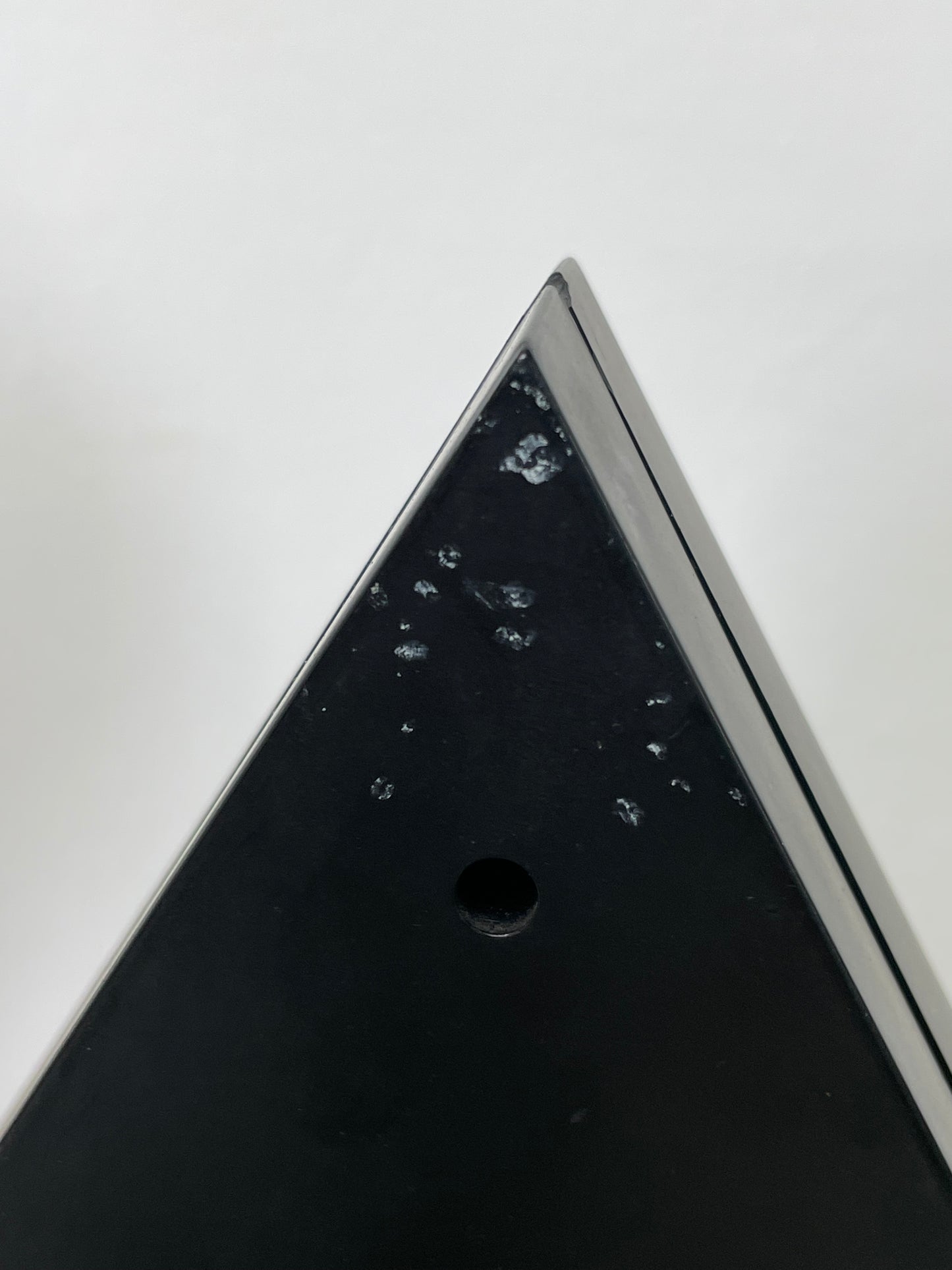 Black triangular 80’s clock