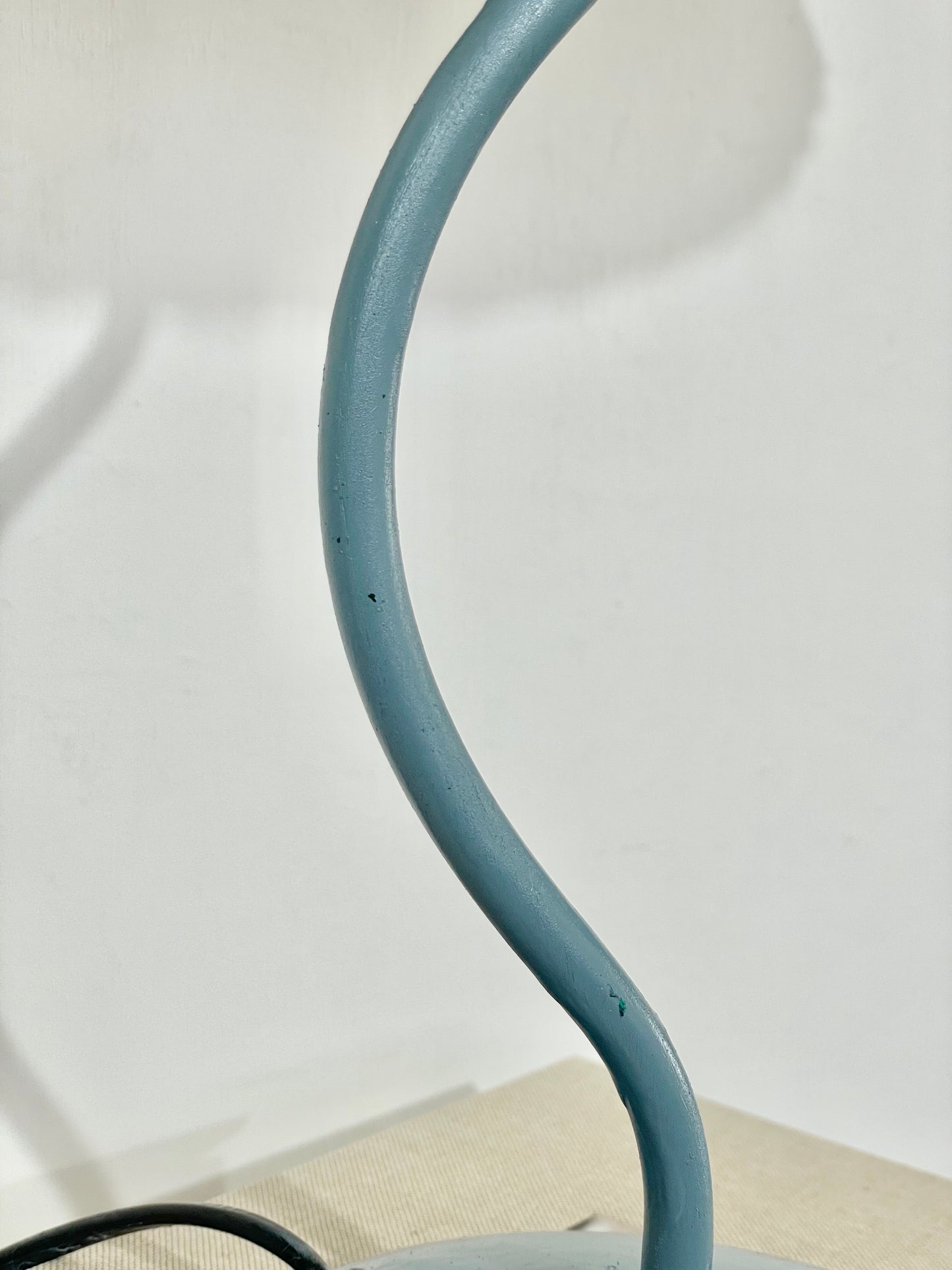 Wavy lamp with lilac ripple shade