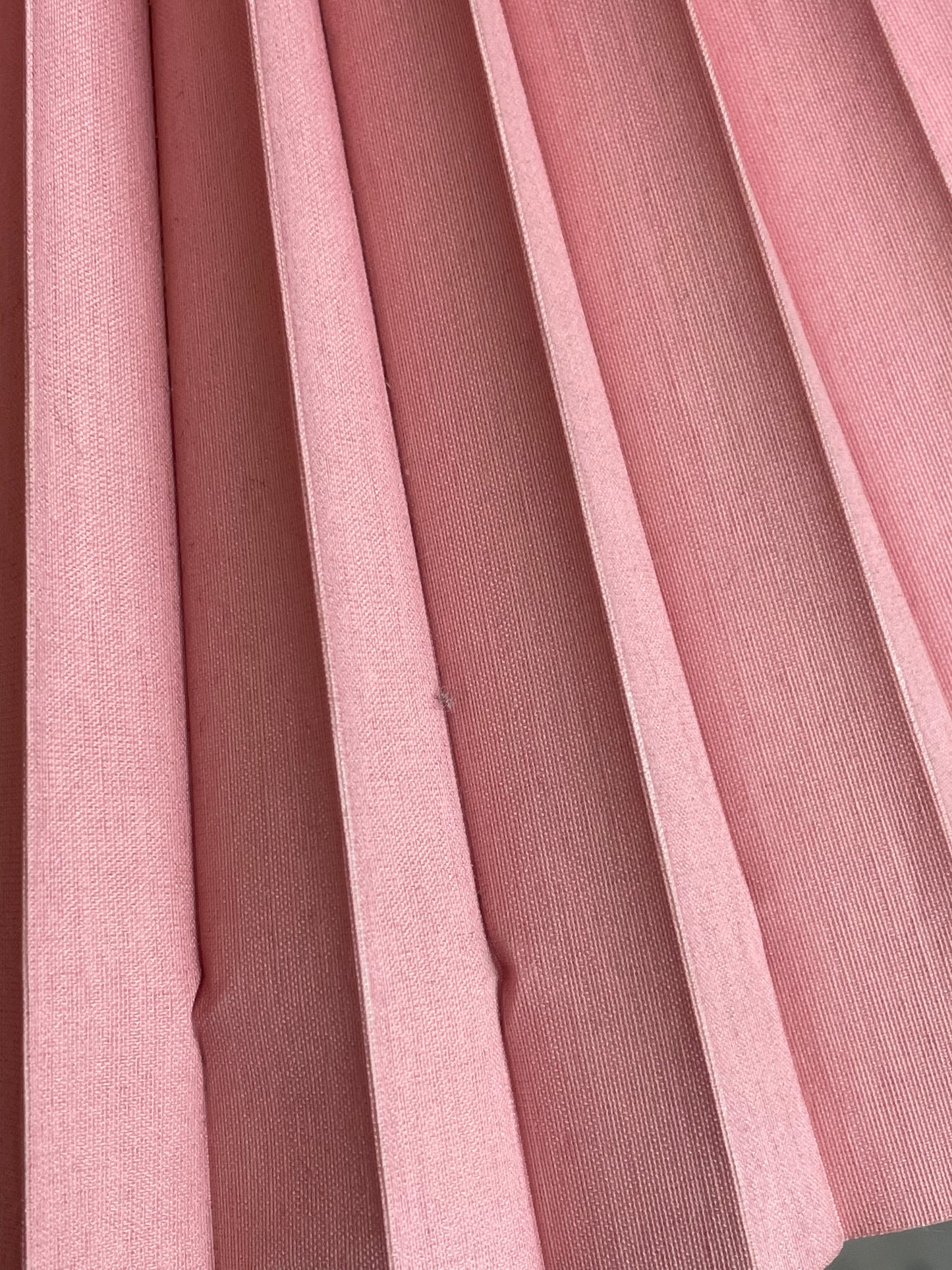 Pink corinthian column lamp with pleated shade