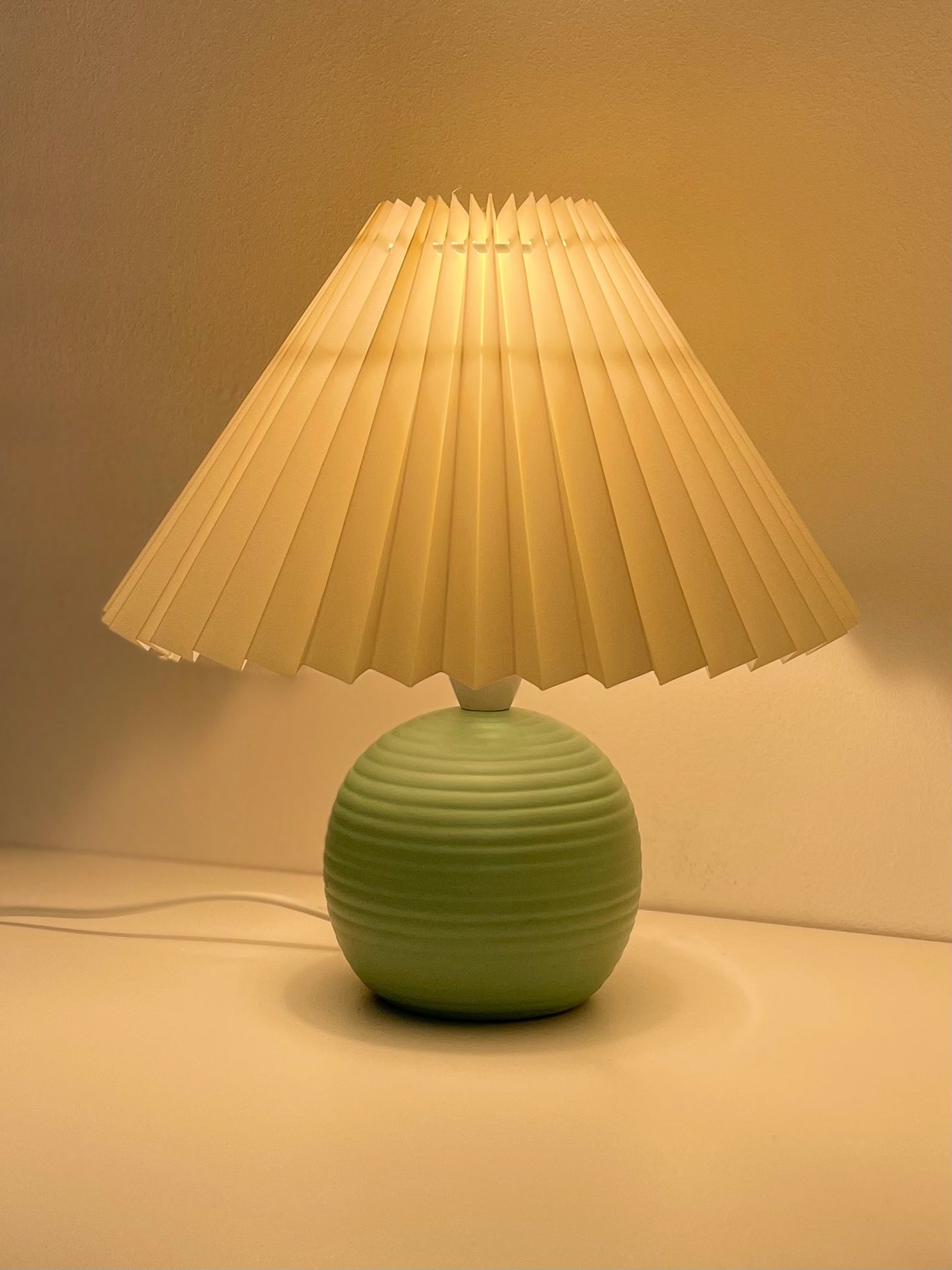 Ribbed ball lamps with pleated shade