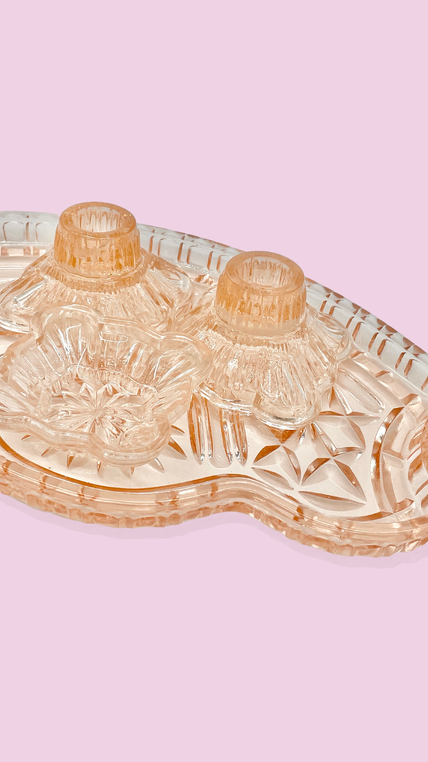 Pair of peachy pink glass candlestick holders