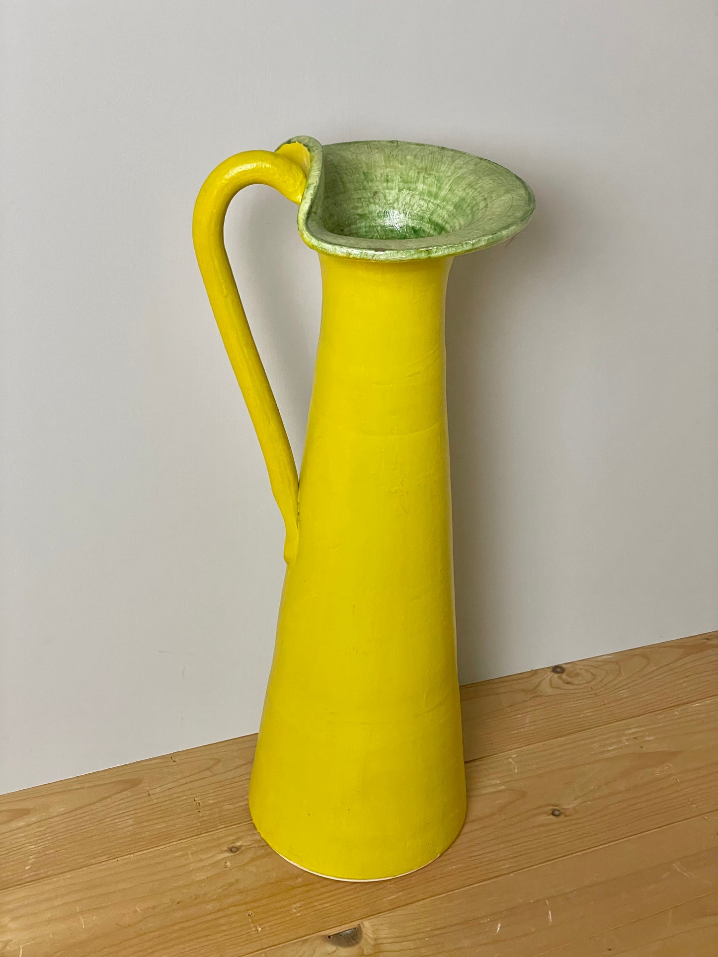 Large handmade yellow conical jug