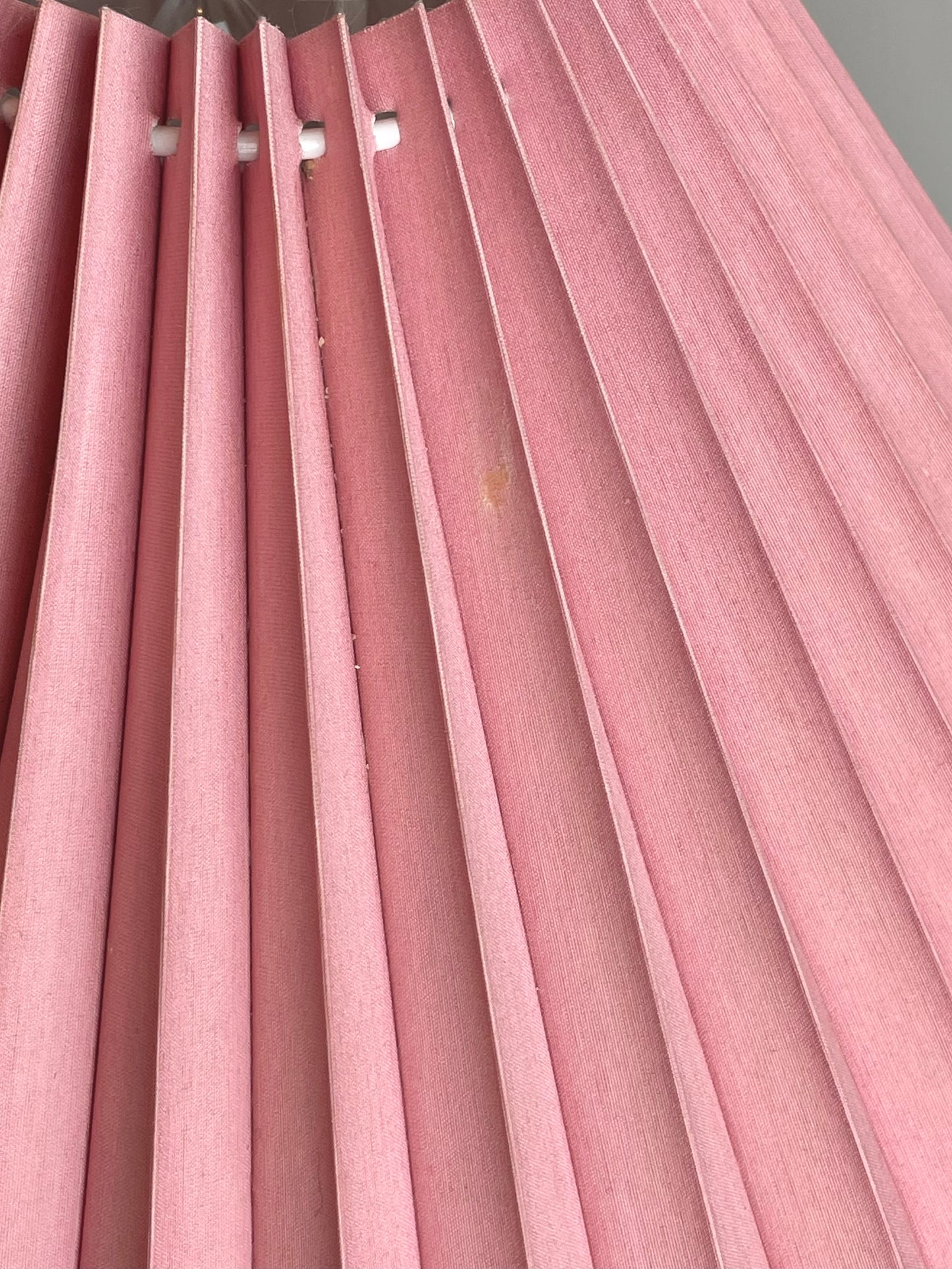Pink corinthian column lamp with pleated shade