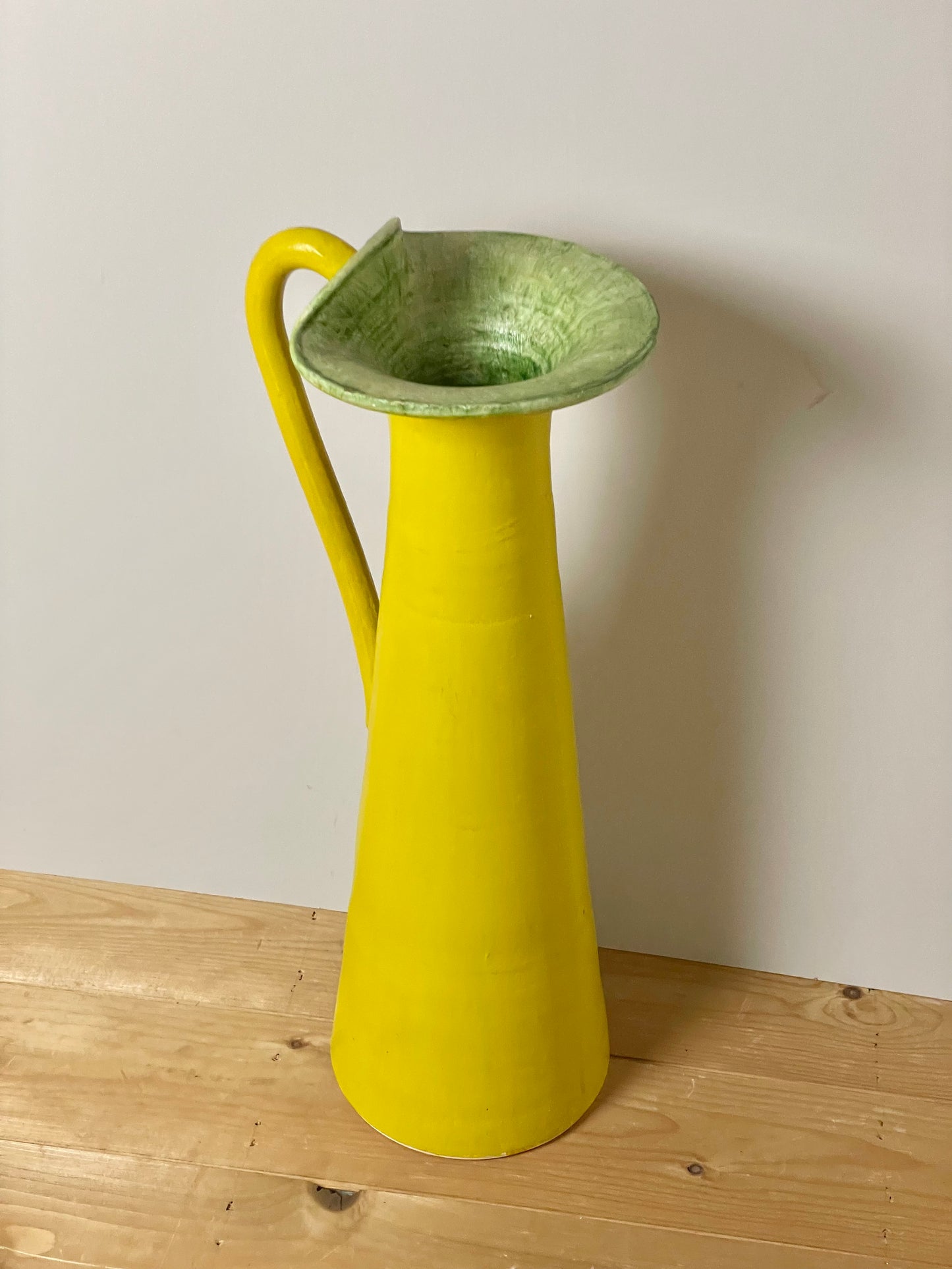 Large handmade yellow conical jug