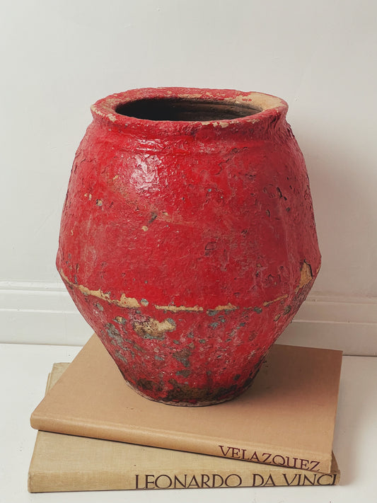 Red painted antique pot