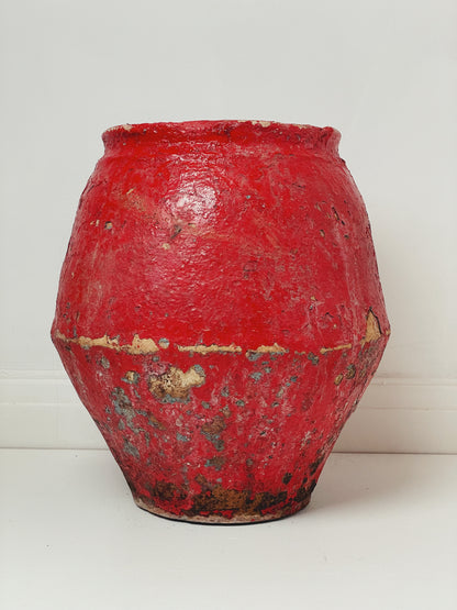 Red painted antique pot