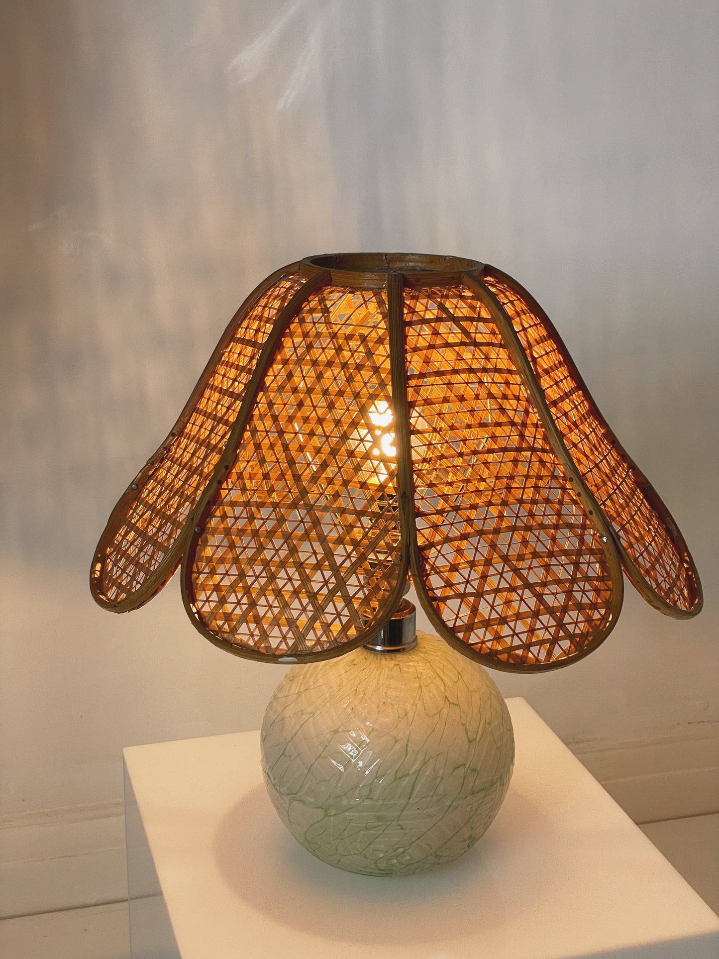 Rattan and glass lamp