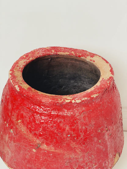 Red painted antique pot