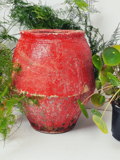 Red painted antique pot