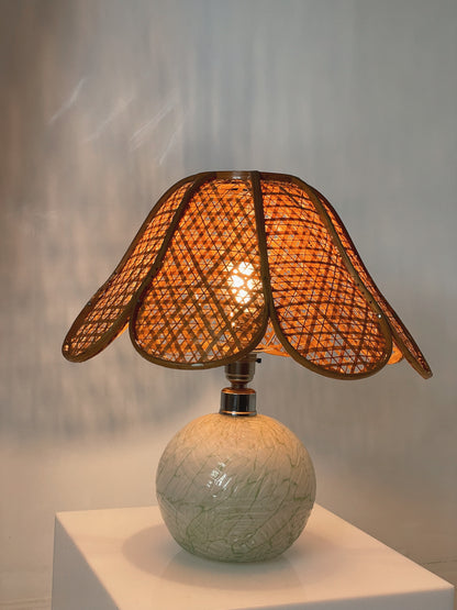 Rattan and glass lamp