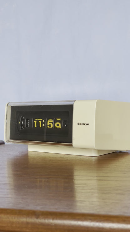 Cream 80’s Sankyo roll clock