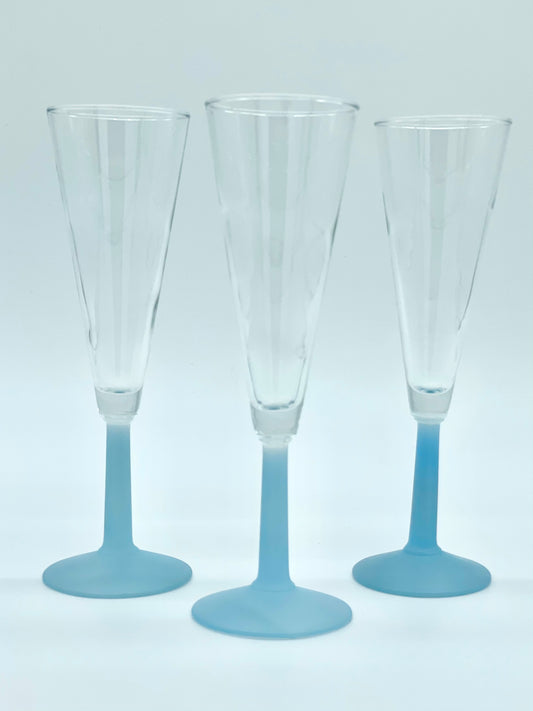 Set of three baby blue stemmed fluted glasses