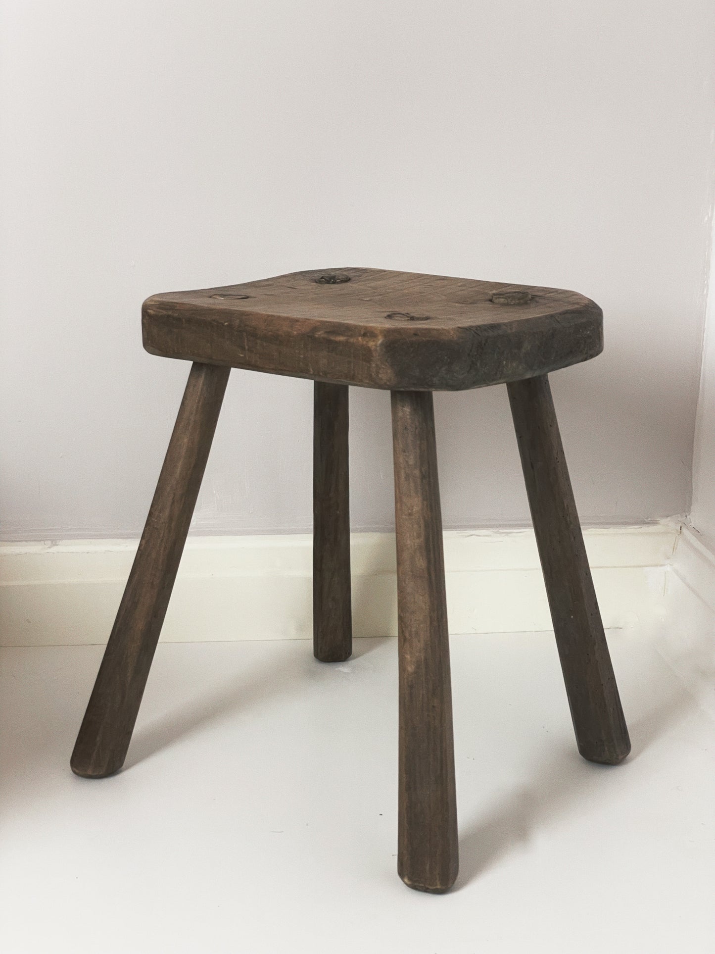 Antique milking stool