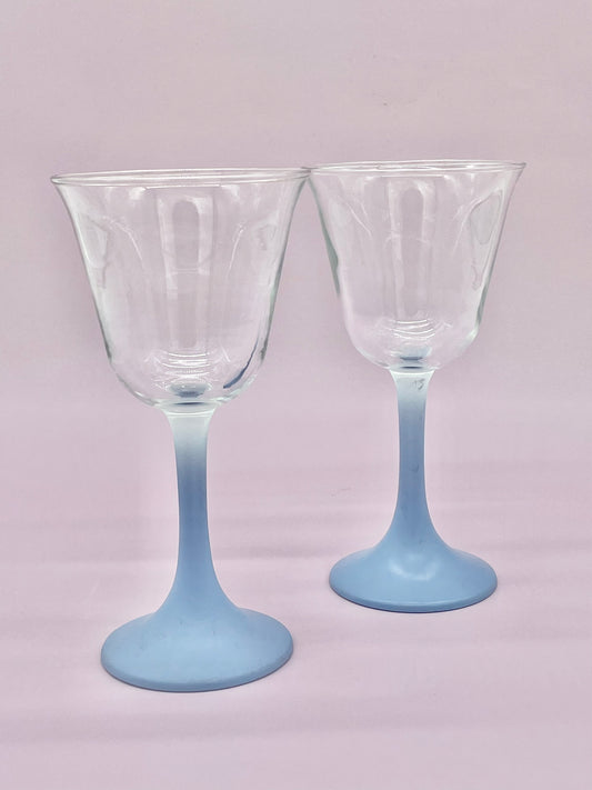 Pair of powder blue stemmed glasses