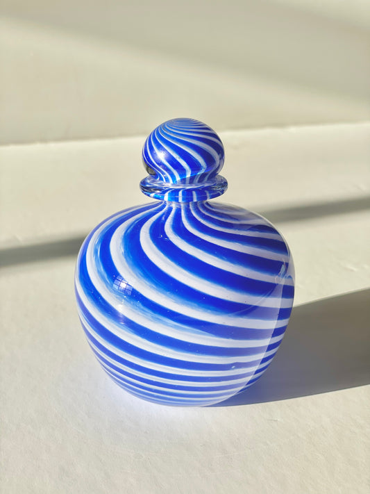 Navy swirl hand blown glass bottle