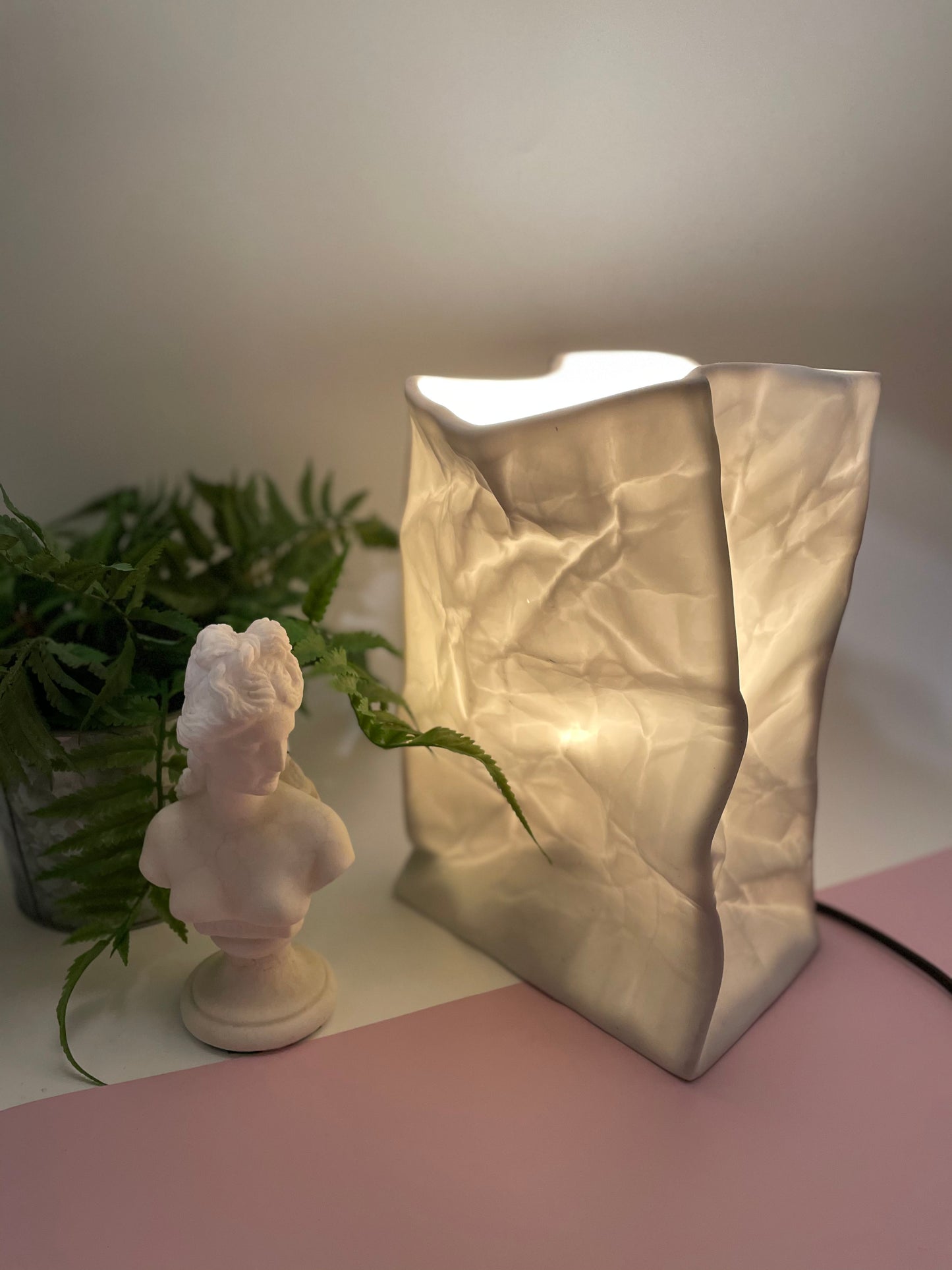 Paper bag style ceramic lamp