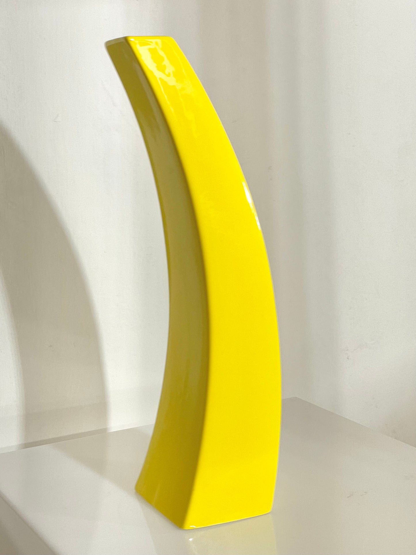 Memphis style curved yellow vase