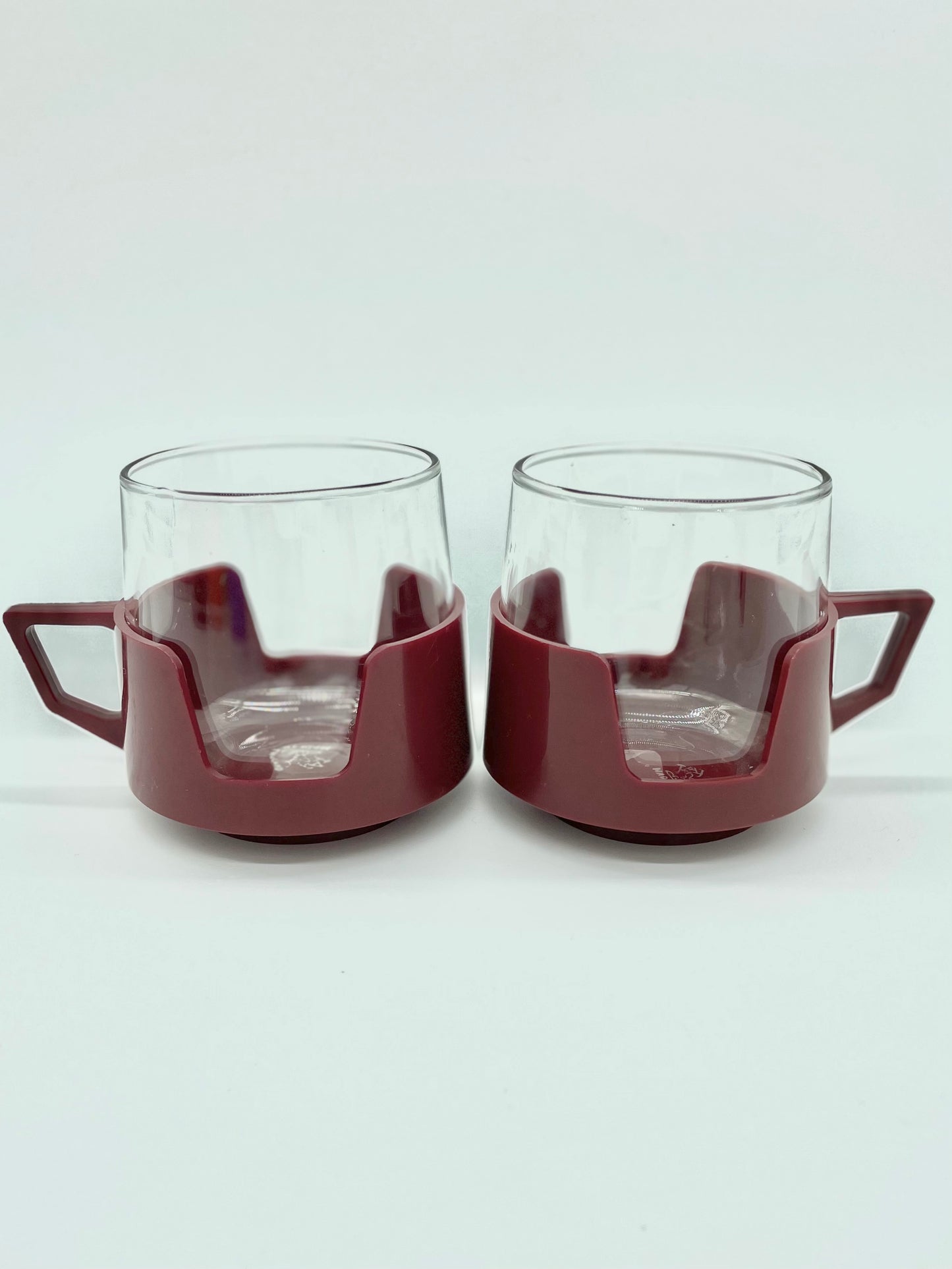 Pair of Retro JAJ glass cups with coloured holders