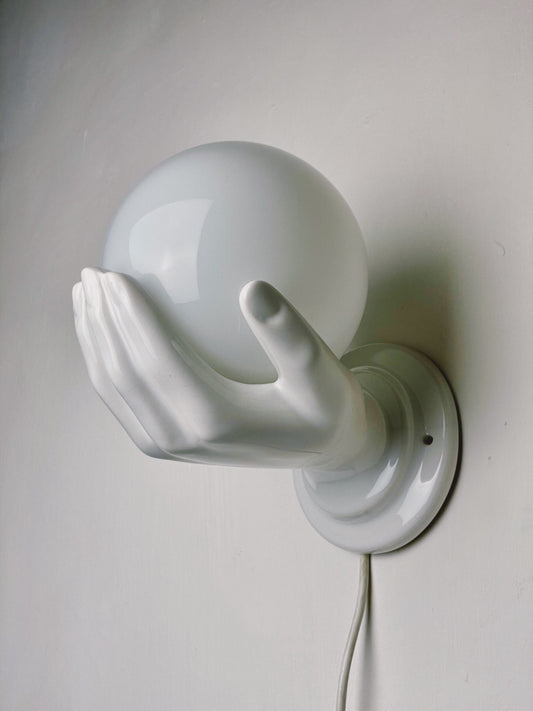 1980’s ceramic hand holding globe wall light