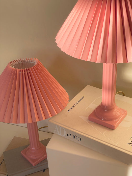 Pink corinthian column lamp with pleated shade