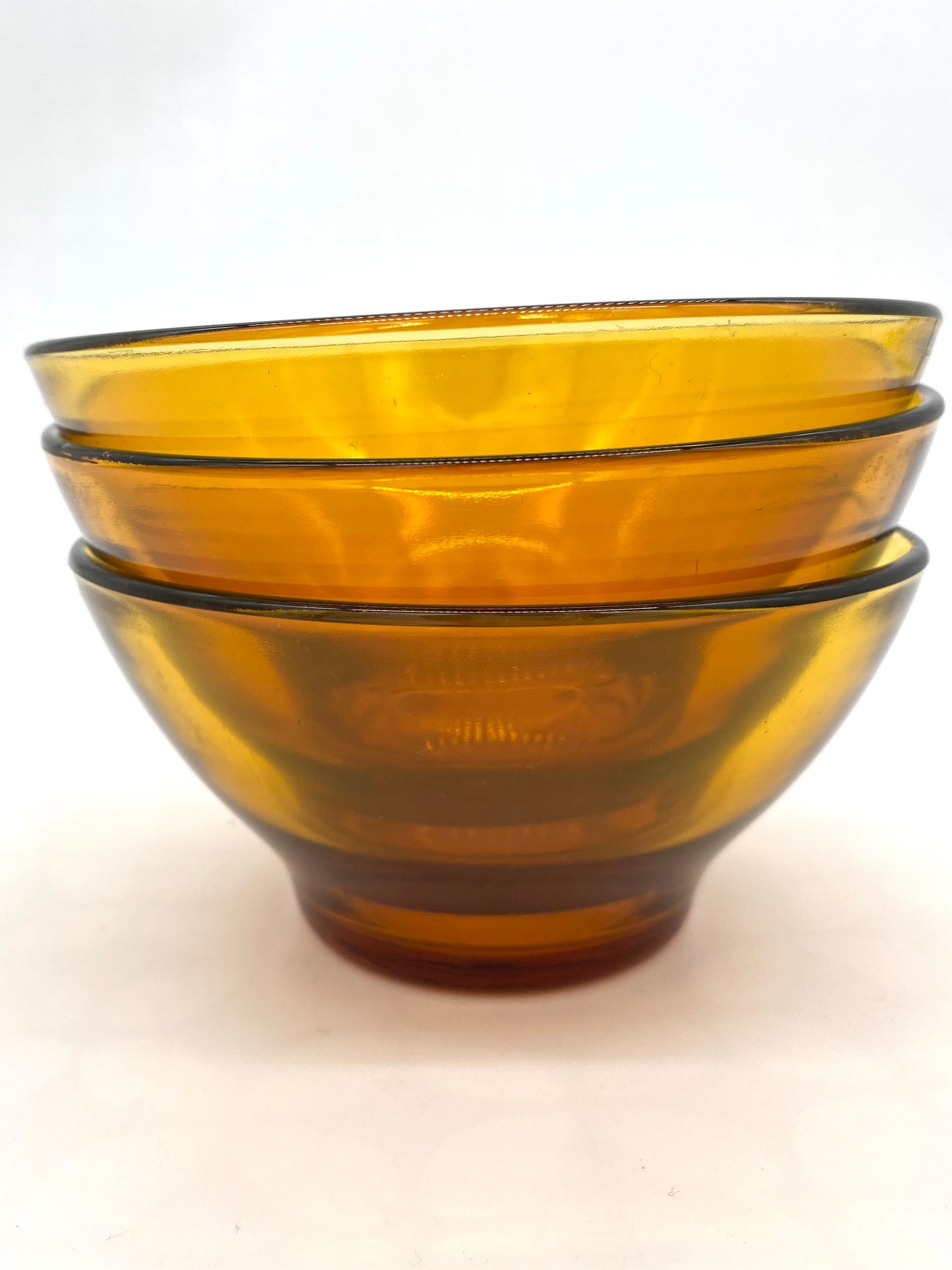 Trio of Verico glass amber bowls