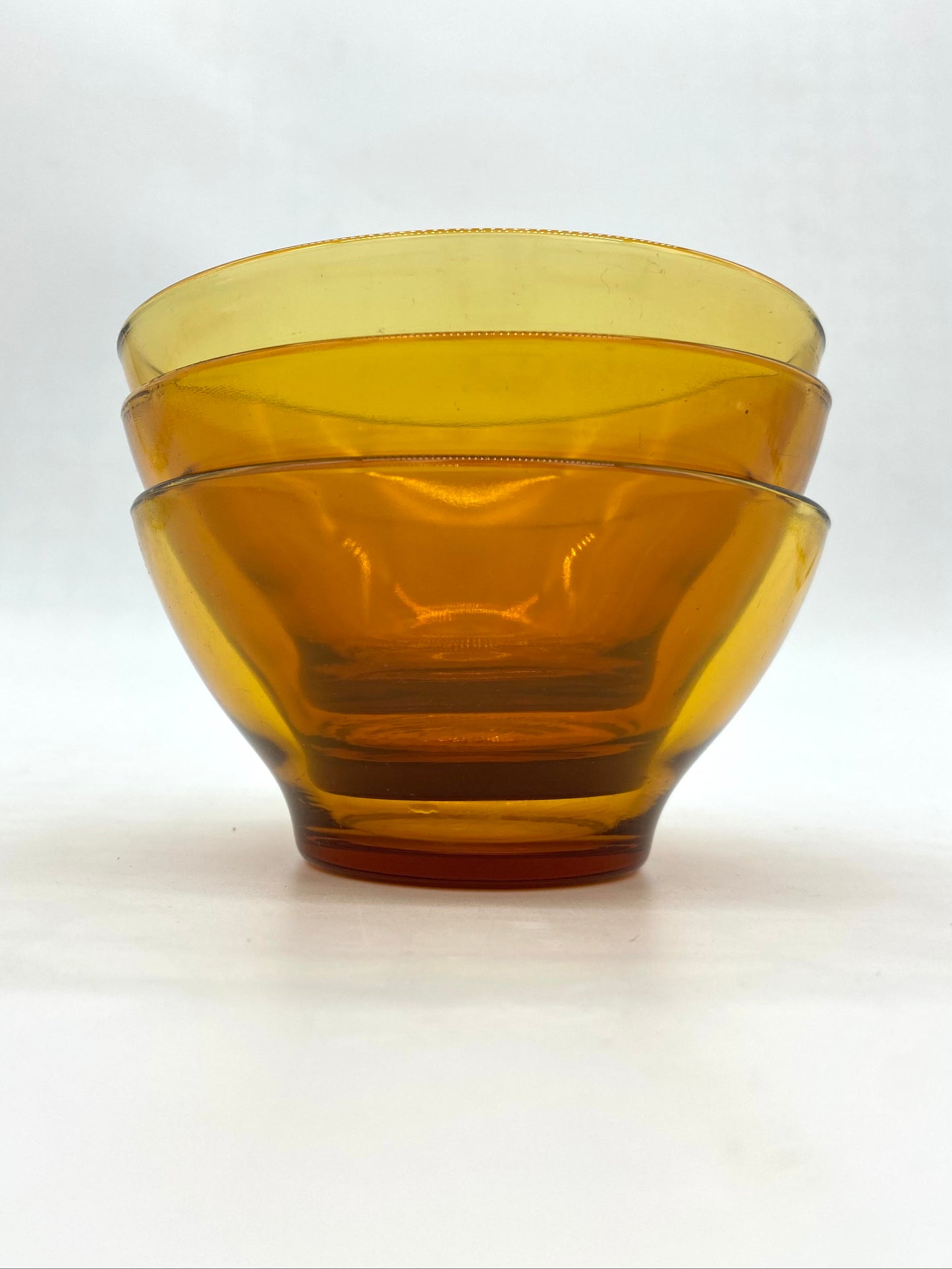 Trio of Verico glass amber bowls