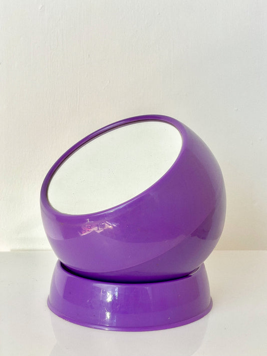 Space age style purple vanity mirror