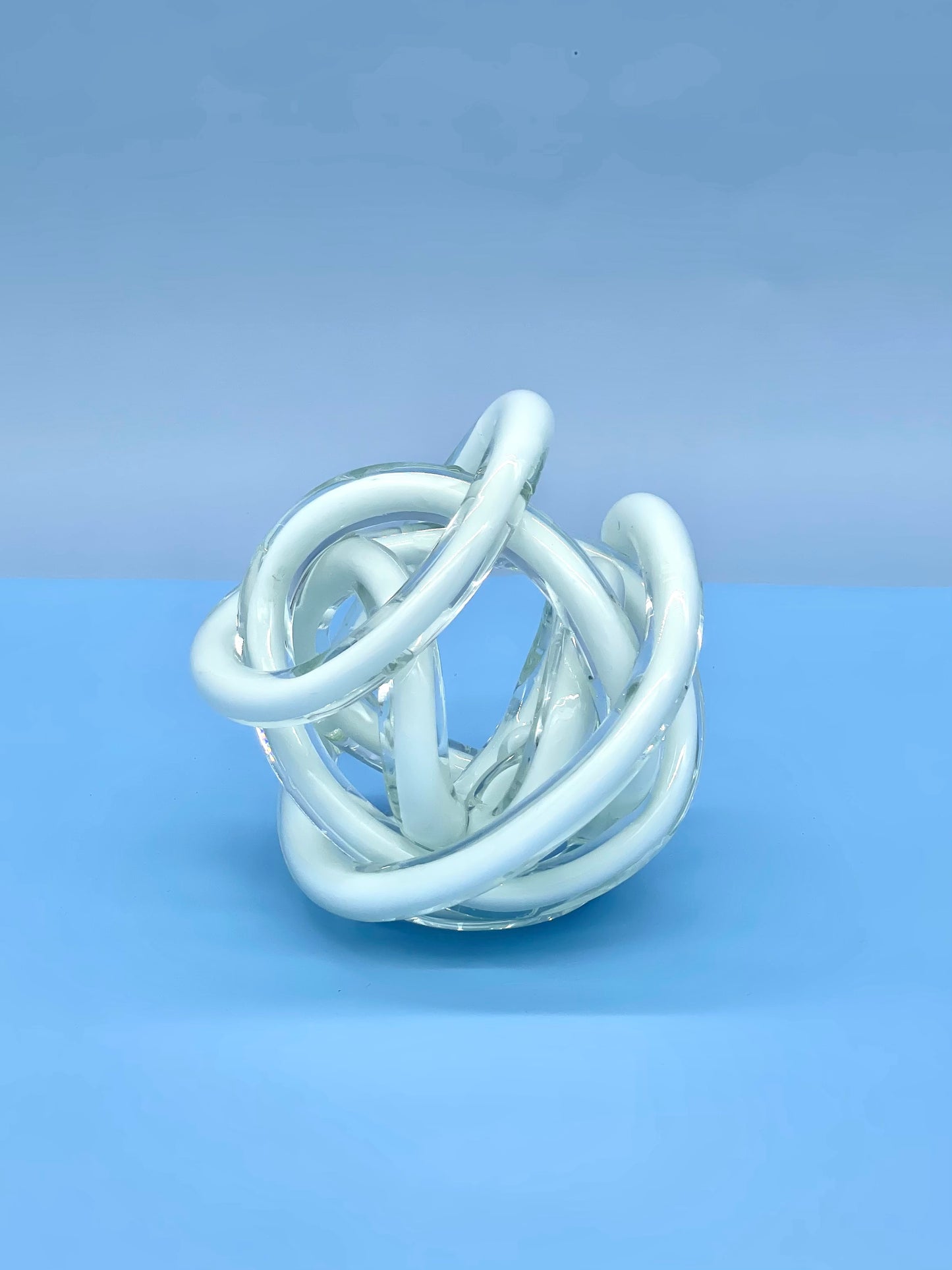 White cased glass twisted knot