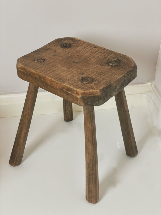 Antique milking stool