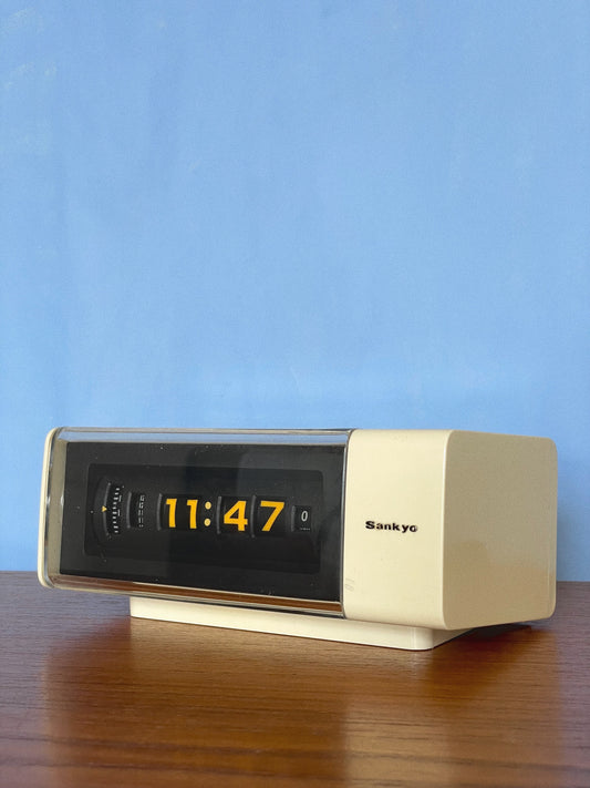 Cream 80’s Sankyo roll clock