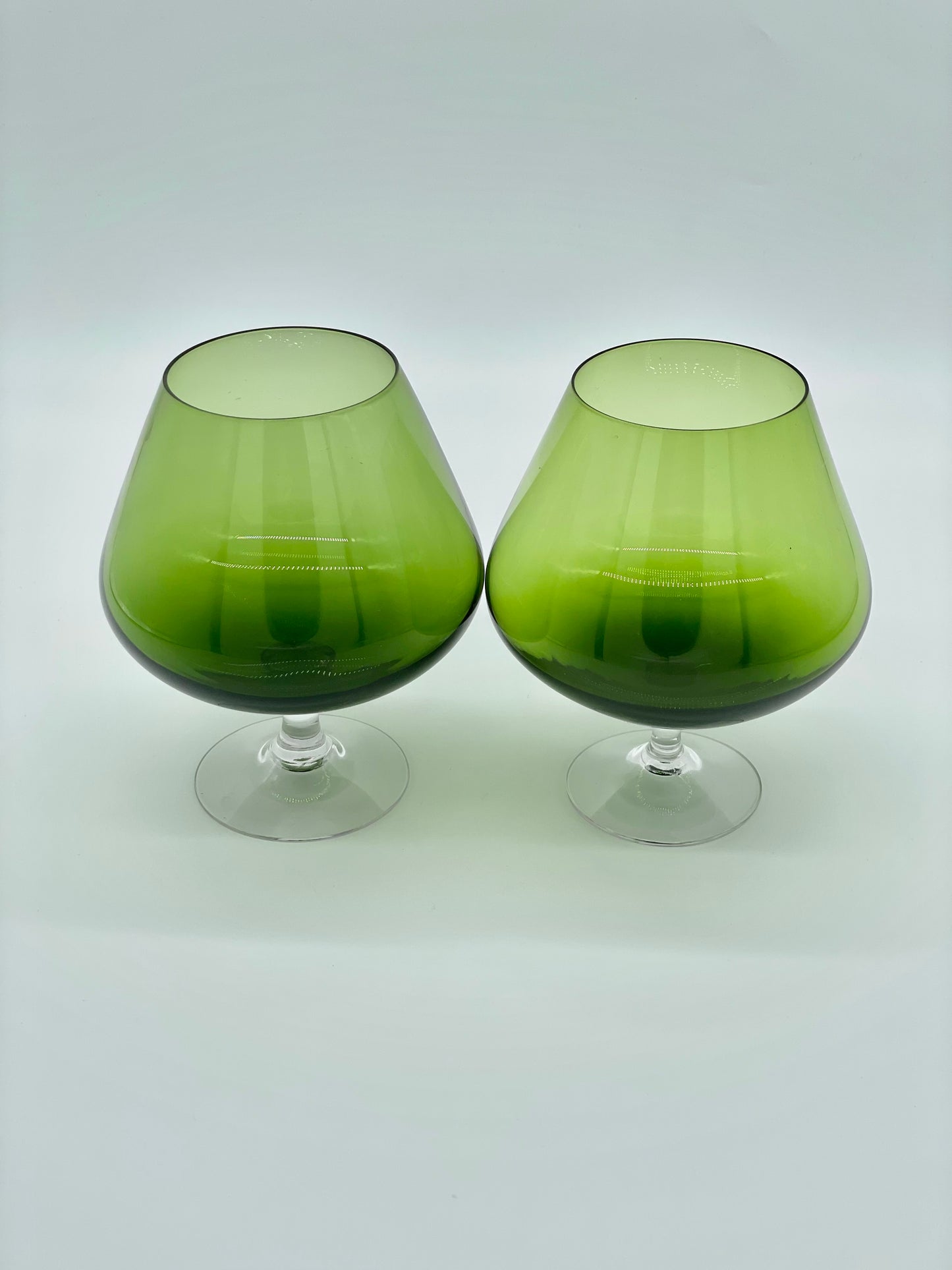 Large mid-century green glasses