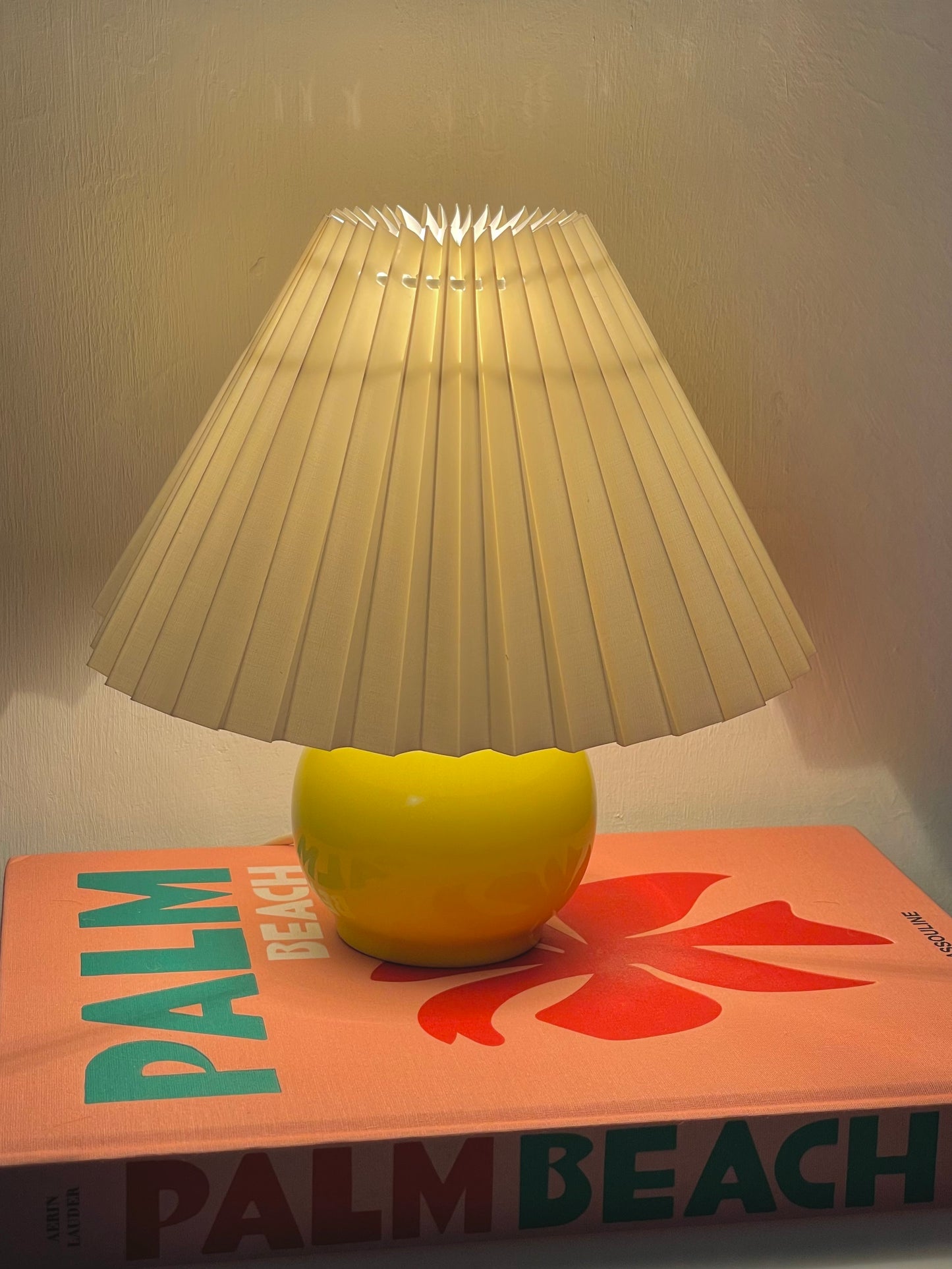 Yellow ball lamp with pleated shade