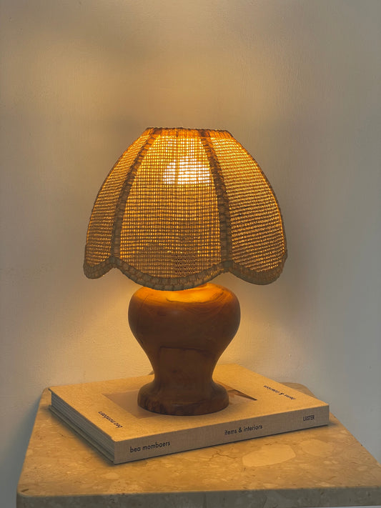 Natural wood lamp with scalloped rattan shade